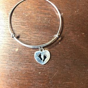 Silver bracelet one charm baby foot prints